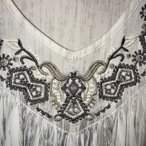 Silky black, white and tan sleeveless tunic.